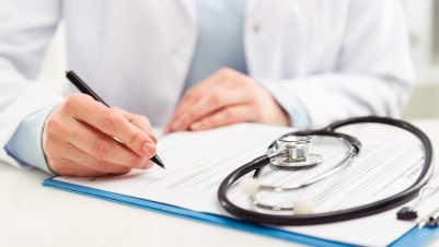 Vet doing paperwork
